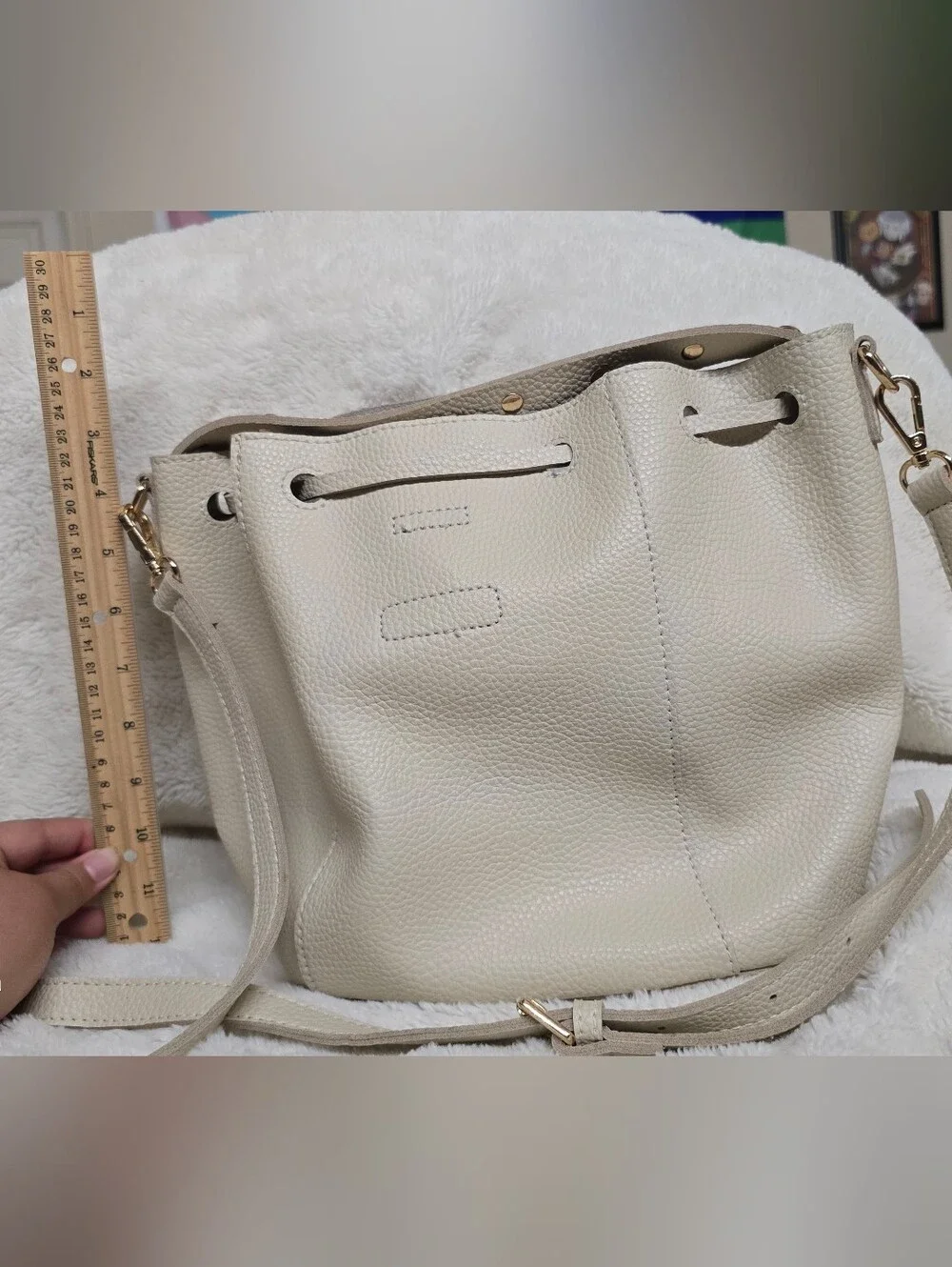 Cream Pebbled Leather Drawstring Shoulder Bucket Bag with Gold Accents